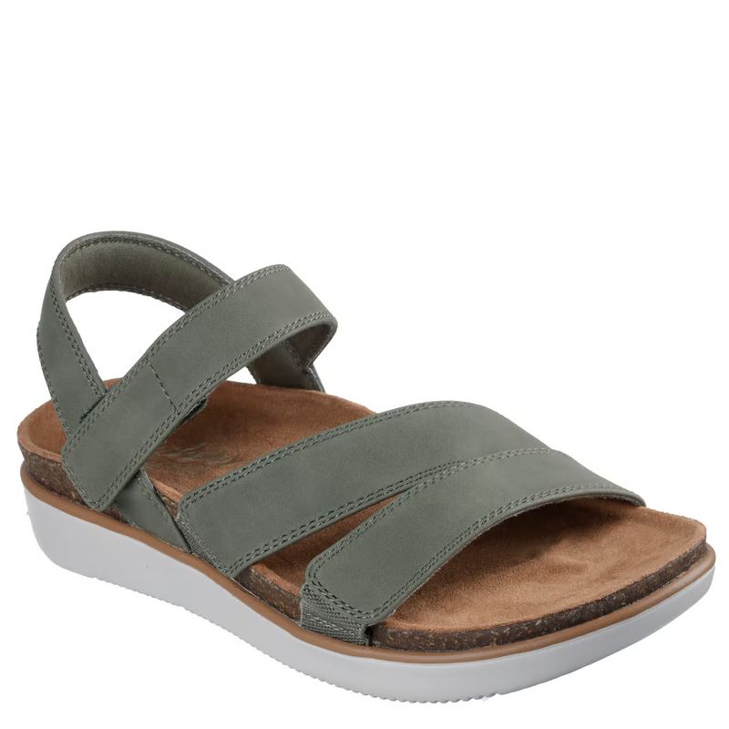 skechers sandal i en fin grøn farve og en lys bund, sandalen er med justerbare velcro stropper, en dejlig komfort.