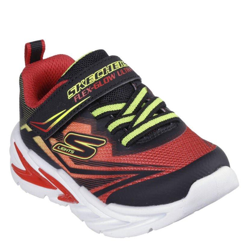 Skechers børne sko, er en sporty og farverig model.
Den har en overdel i rød mesh med sorte og neongule detaljer samt en kraftig, hvid og rød mellemsål. Skoen har elastiske snørebånd og en praktisk velcrostrop med logo. Den er også udstyret med lys i sålen, hvilket gør den ekstra populær blandt børn.