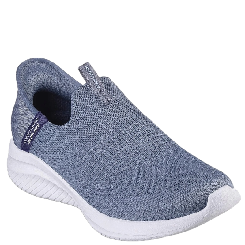 Skechers  er en dameslip‑on sneaker med strikket overdel, blød Air‑Cooled Memory Foam indlægssål og fleksibel ydersål. Den er let, komfortabel, vegansk og nem at tage på, velegnet til hverdag og gåture.