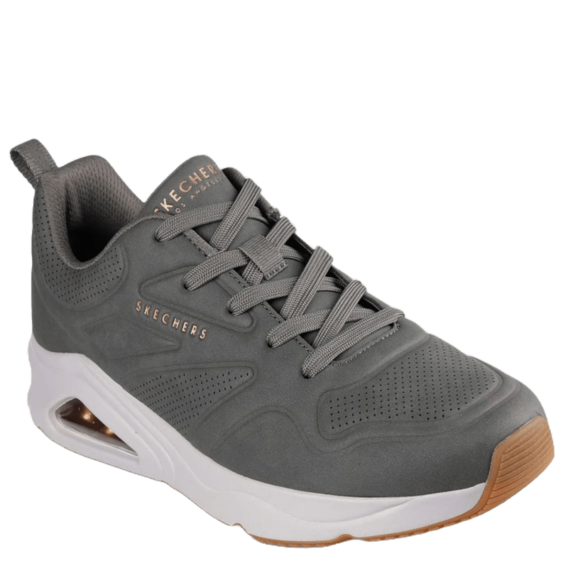 Skechers sneaker i grå med et moderne og sporty design til herre. Den har perforeret overdel for åndbarhed, snørelukning og en hvid mellemsål med synlig Air Cushion-dæmpning. Ydersålen har gummidetaljer for godt greb, og skoen kombinerer komfort med et stilrent hverdagslook.